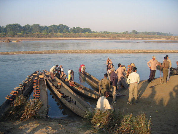 Tourists boarding canoes for a morning paddle, Chitwan National Park