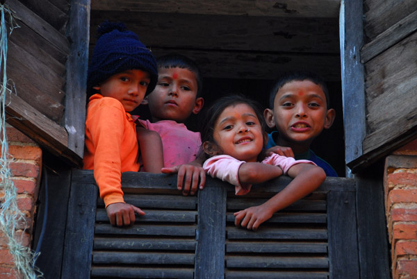 Nepali kids in a window, Bandipur