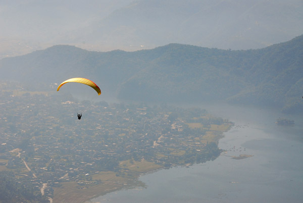 Pokhara's Phewa Lake with a paraglider