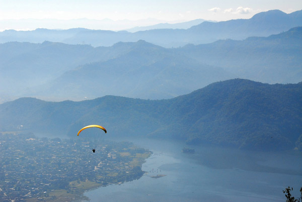 Pokhara's Phewa Lake with a paraglider