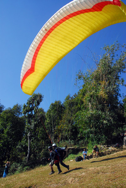 Tandem paraglider launch, Sarangkot, Nepal