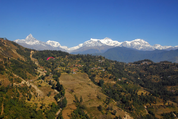 Soaring over Sarangkot with the Annapurna Range running east from Machhapuchhare