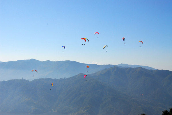 Flock of paragliders, Sarangkot, Nepal