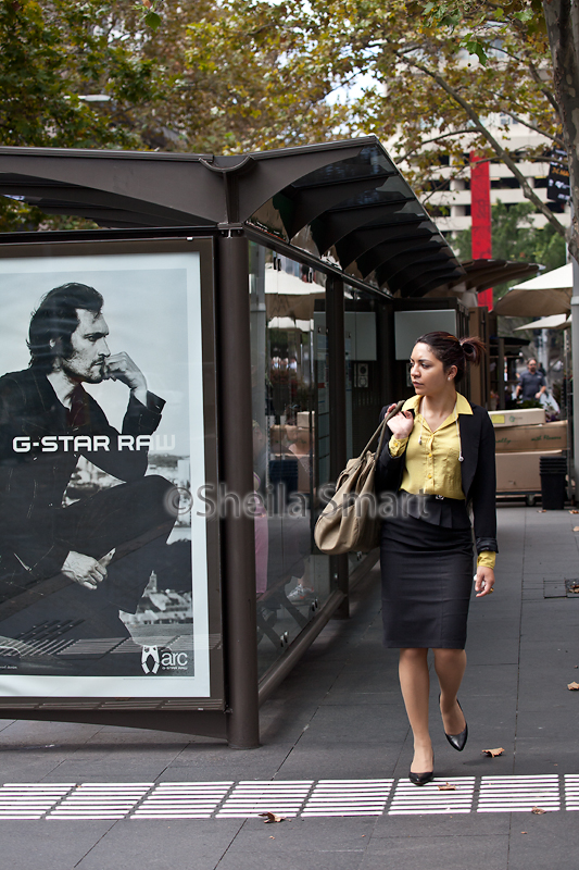 Man in poster with young woman 