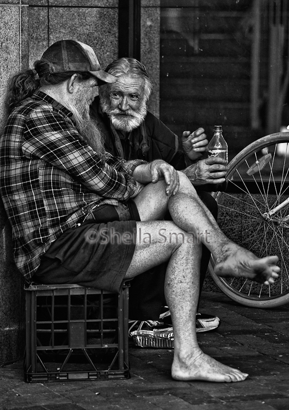 Two old guys chatting at the Quay