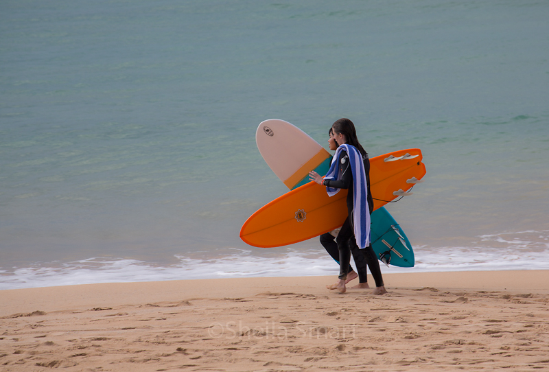 Two surfers at Manly Beach