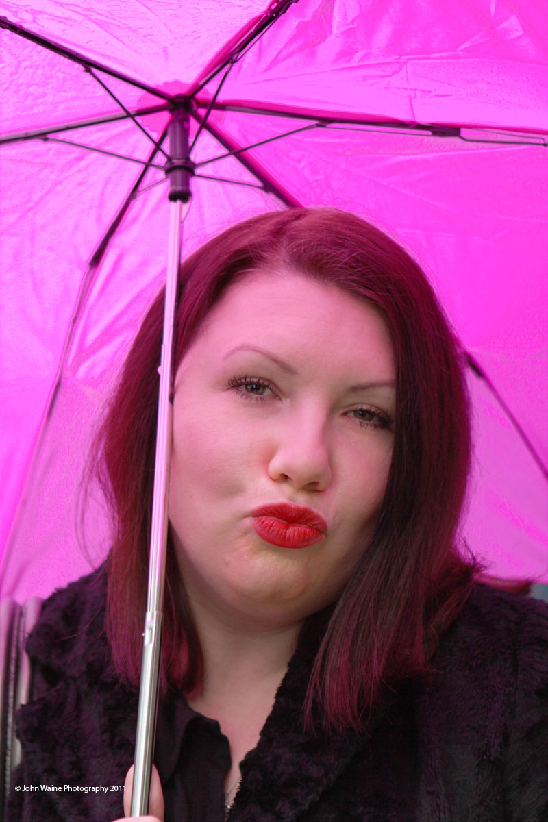 Girl With Pink Brolly In The BAFTAs Queue