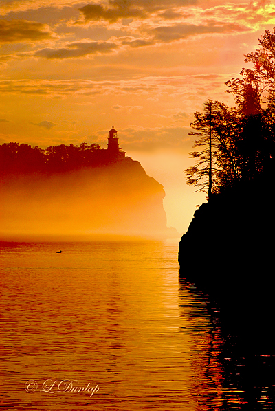 40.4 - Split Rock Lighthouse With Loon In Sunrise Fog