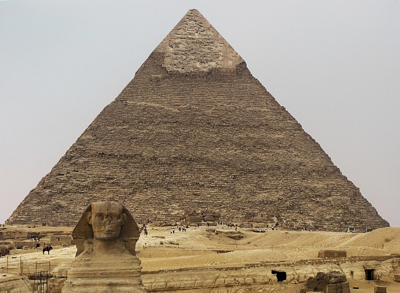 Bracing himself for the throngs, the Sphinx looks tense. View from outside low-walled area.