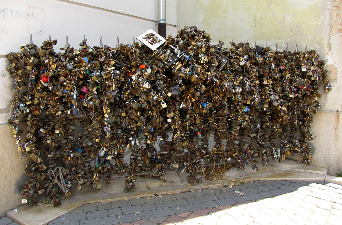 Locks in Pecs.  The legend is that if a couple place a lock on this gate and throw away the key they will have eternal love.