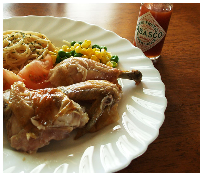 Slow roast chicken, Spaghetti coated with fresh garlic, herbs and sauce from roast pan