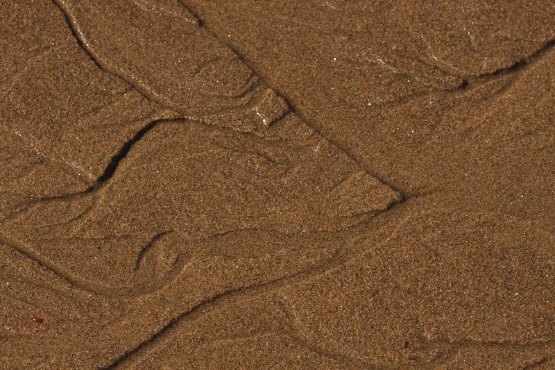 Lijnen spel van zand en water