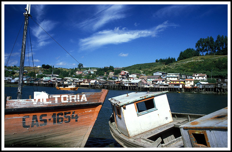 Boats and Palofito (stilt) Houses Along Harbor