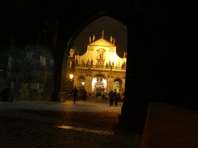 People in passage beneath the tower