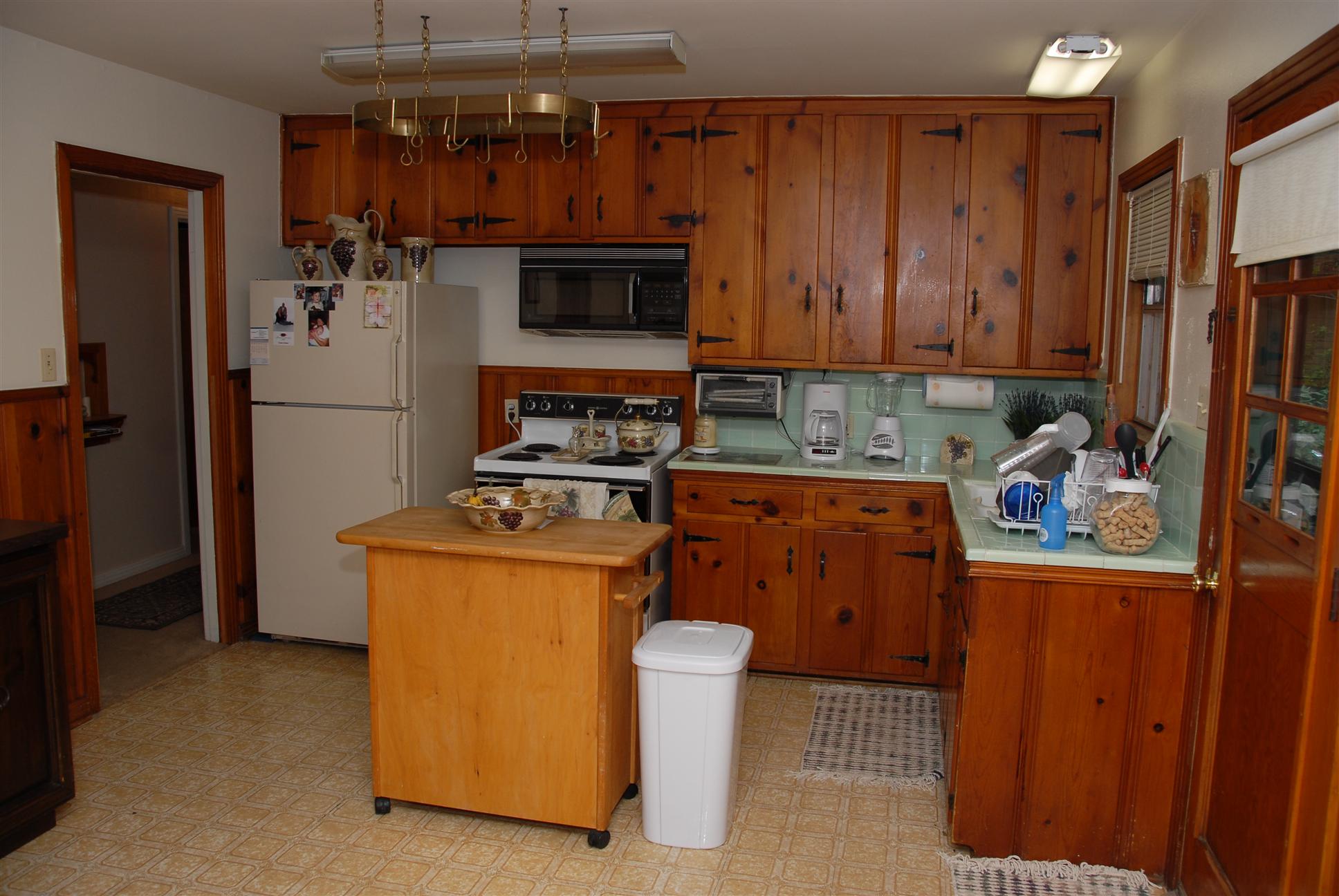 View of kitchen, from dining area