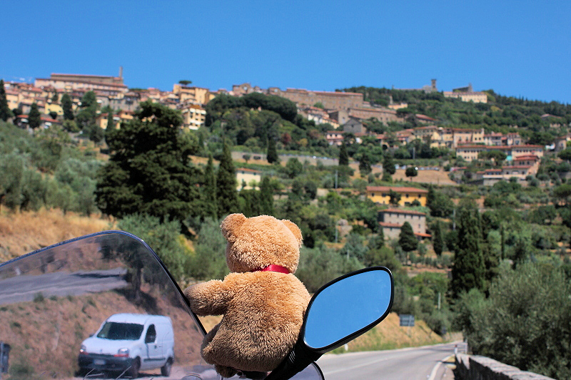 Travelling by motorbike over  charming Tuscany countryside