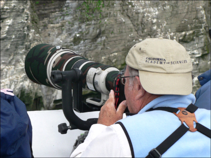 Tom capturing the Gannets and Murres in the Westermann Isles
