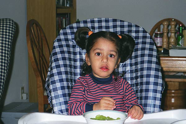Zoya in her high chair.