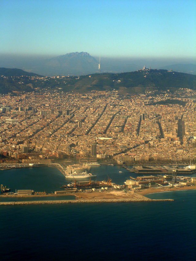 Barcelona from the air, with Montserrat poking through the haze