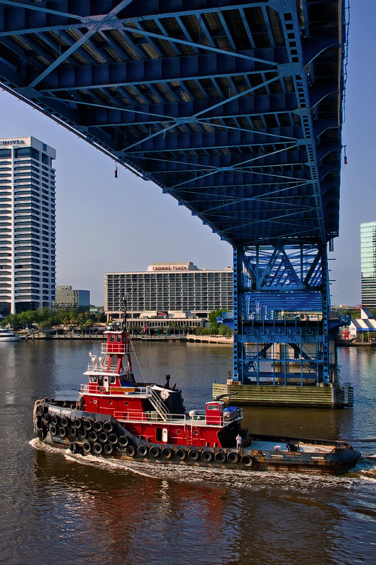 Big Red Tug under the Main Street Bridge