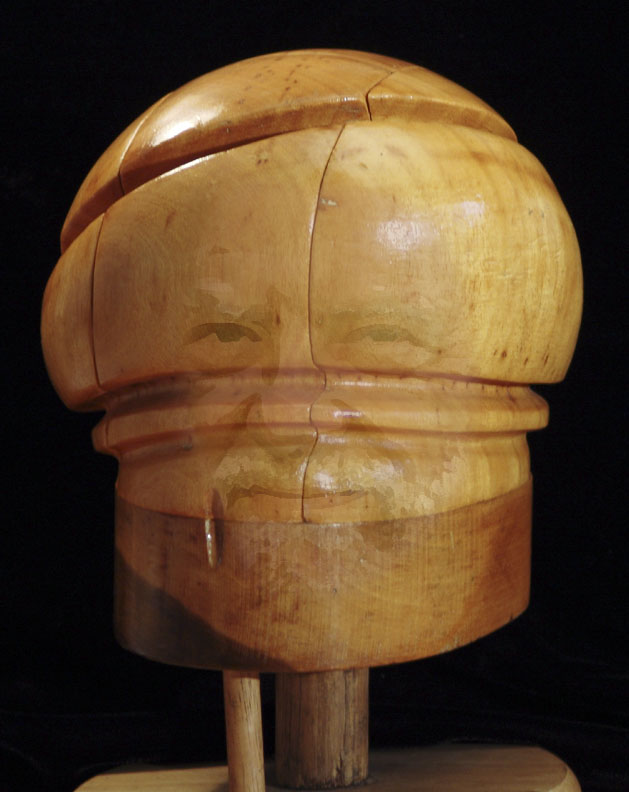 <b>8th Place</b><br>Portrait of the artist as a hat mold <br> by inframan