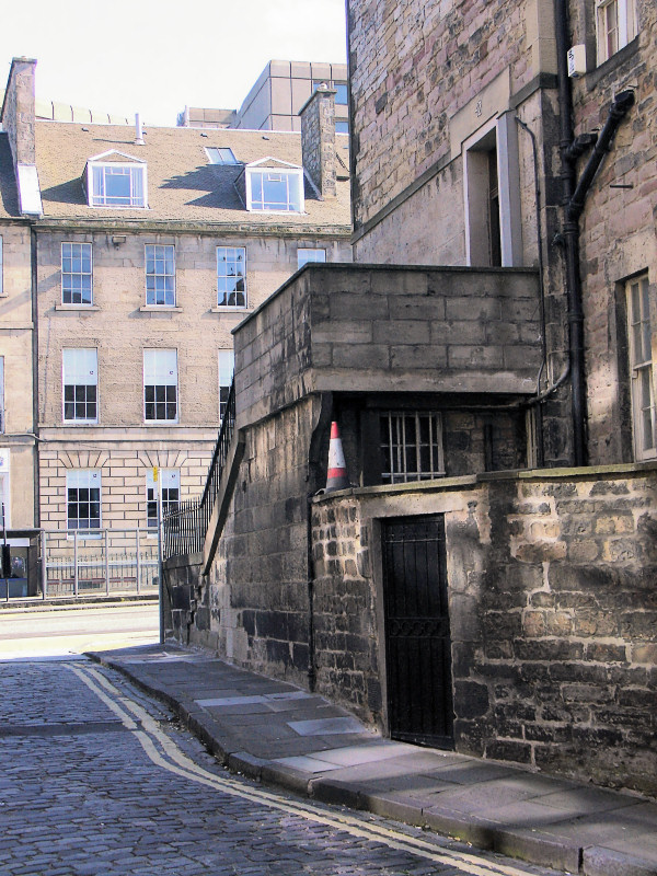 Stonework and a Traffic Cone