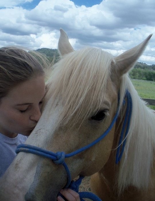 Taylor and Nettie on Hitch Rack  Ranch in Colorado Springs.