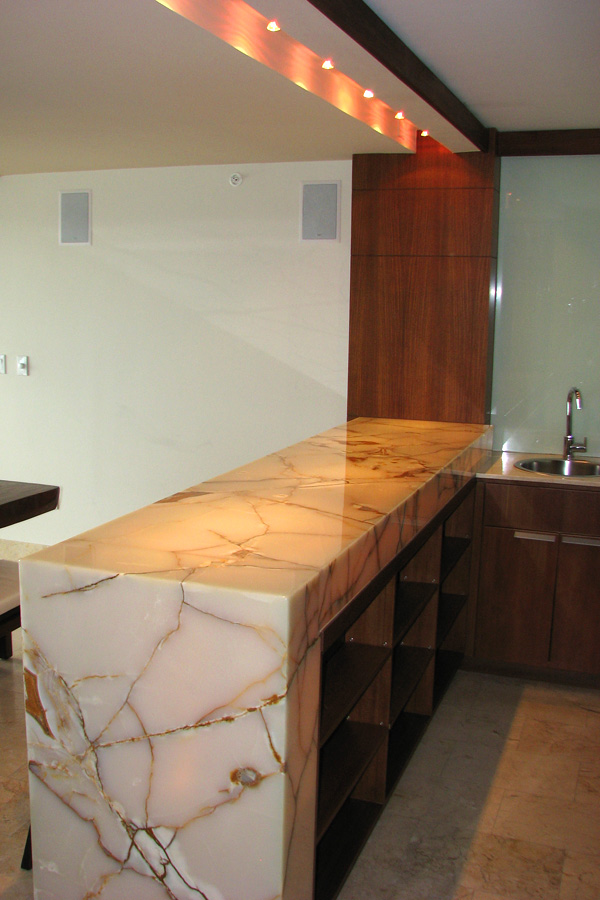 Penthouse bar with solid onyx surface