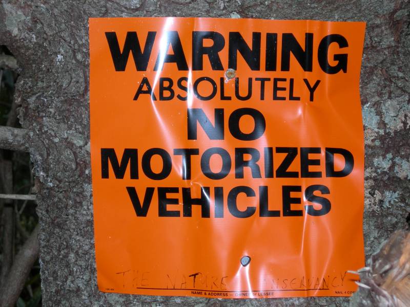 we unbent the sign at The Nature Conservancys property