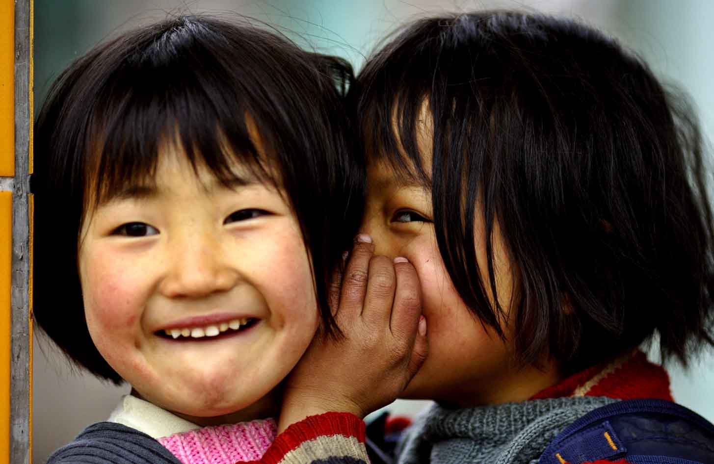 Two girls telling a secret, Ping Shan Po