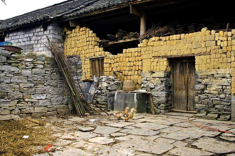 3 types of building material commonly used. Cement block, stone and adobe.