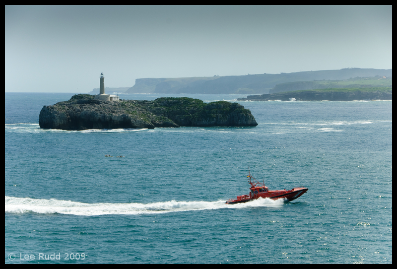 Lighthouse On The Rocks....