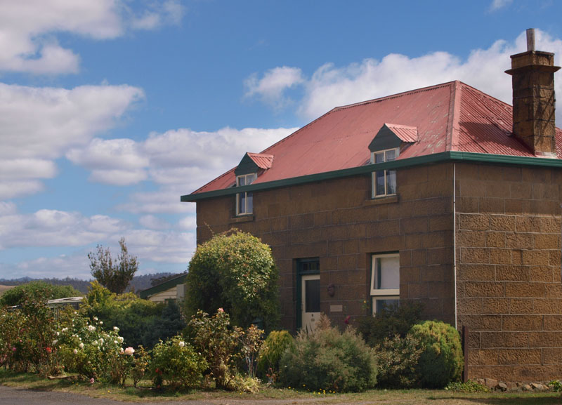 House and garden in main street