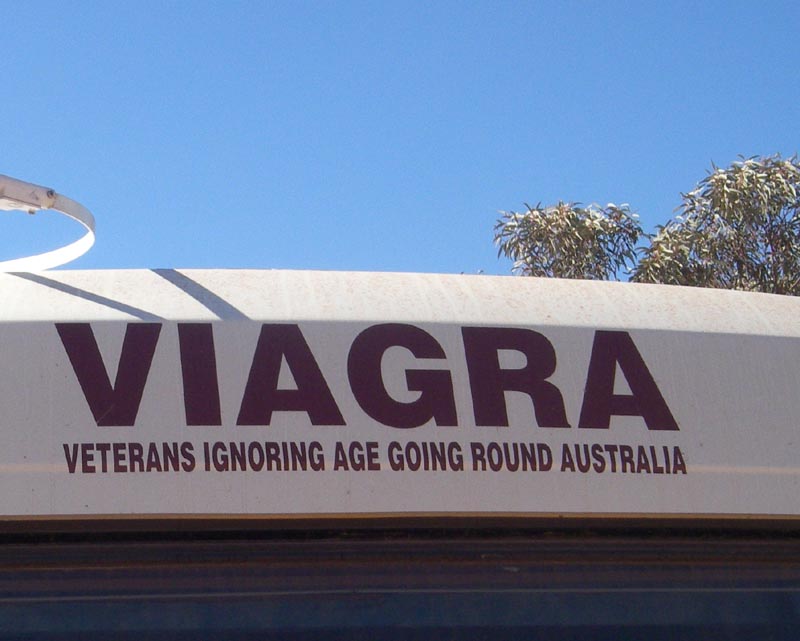 Sign on dusty bus