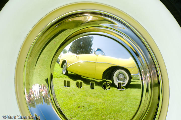 1954 Buick Skylark reflected in 1948 Buick Hubcap