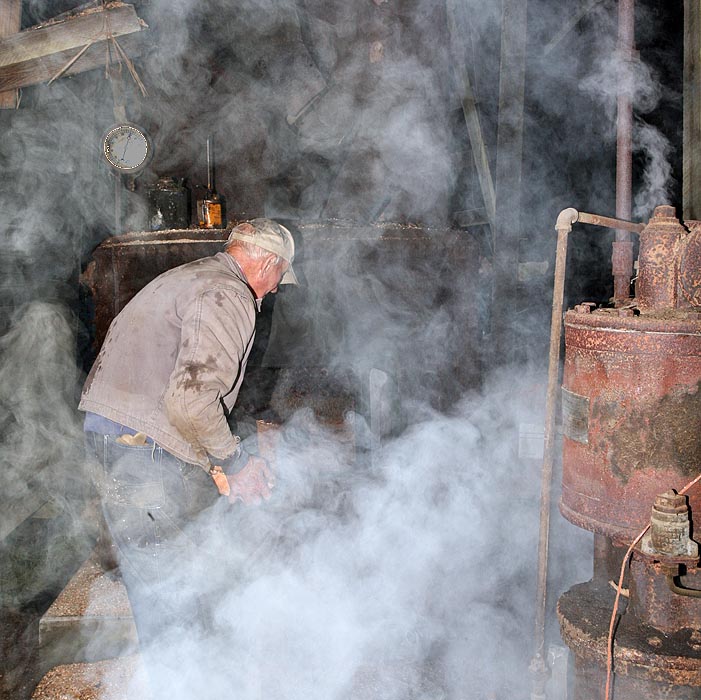 Gene feeding the boiler ----- IMG_0845a.jpg