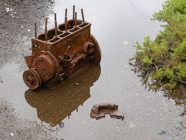 puddles and machinery at Denniston