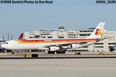 Iberia A340-313X EC-GQK with Miami International's main terminal in background airline aviation stock photo #0261