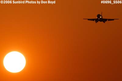 FedEx MD10-10F N566FE (ex American N130AA) cargo airliner aviation sunset stock photo #0696