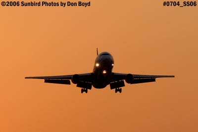 FedEx MD10-10F N566FE (ex American N130AA) cargo airliner aviation sunset stock photo #0704