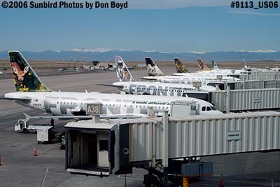 Frontier Airlines A319-112 N943FR and other Frontier aircraft on the DEN ramp airline aviation stock photo #9113