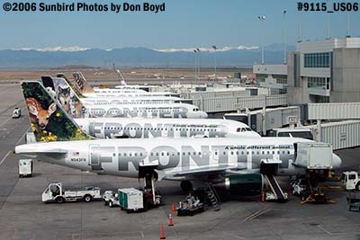Frontier Airlines A319-112 N943FR and other Frontier aircraft on the DEN ramp airline aviation stock photo #9115