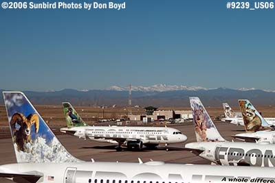 2006 - Frontier Airlines A319-111 N942FR and other Frontier aircraft at Denver airline aviation stock photo #9239