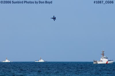 3 Coast Guard Cutters and lone USN Blue Angel military air show aviation stock photo #1087