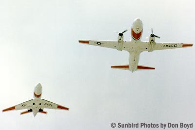 1982 - USCG HU-25 Falcon #CG-2109 and Convair HC-131A flying formation stock photo