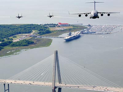 USAF F-15 Eagles and C-17 Globemaster III over the USS Yorktown and USCG Cutter at Charleston