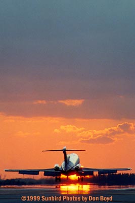 1999 - B727-200 landing on 27-right at Miami International sunset aviation stock photo