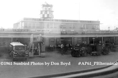 1961 - the Palm Beach International Airport terminal as viewed from inside Delta Airlines DC-7B N4890C aviation stock photo