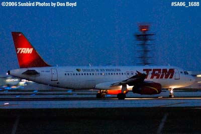 TAM A320-232 PR-MAP on takeoff roll at night airline aviation stock photo #SA06_1688