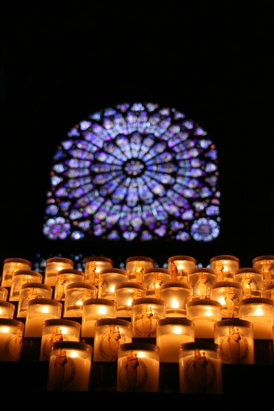Notre Dame candles and stained glass